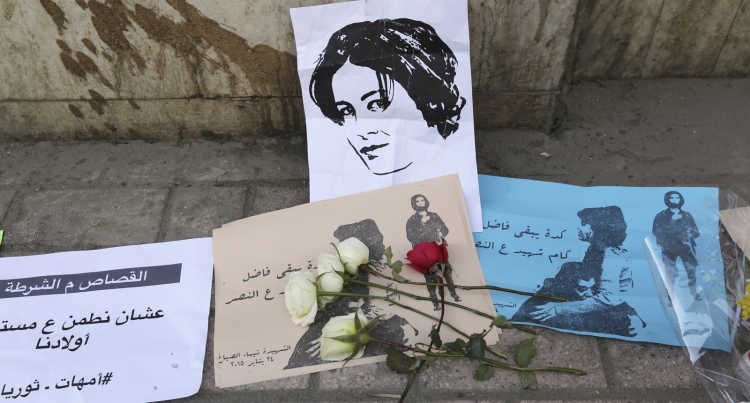 Flowers are seen left at the spot where activist Shaimaa Sabbagh died during a protest in central Cairo