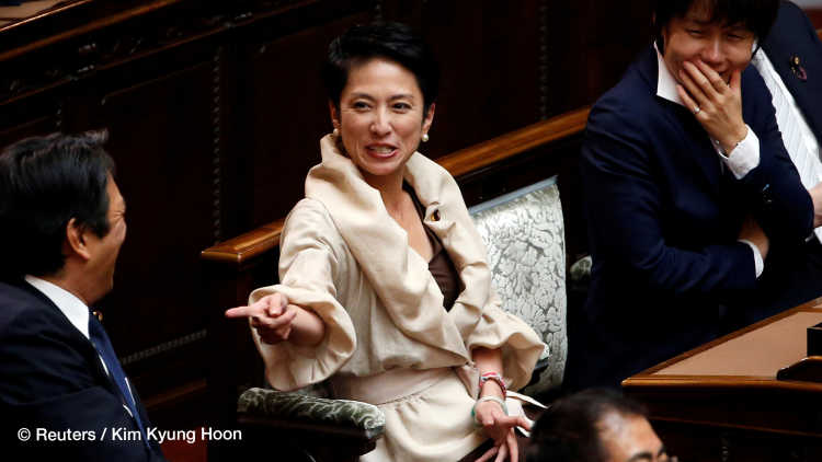 Japan's main opposition Democratic Party's new leader Renho (C) talks with other lawmakers at the Upper House before the start of the new parliament sessio in Tokyo, Japan, September 26, 2016.