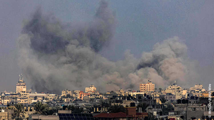 Smoke rises over Khan Yunis during Israeli shelling from Rafah in the southern Gaza Strip on 25 December 2023, amid the ongoing conflict between Israel and the Hamas terrorist group.