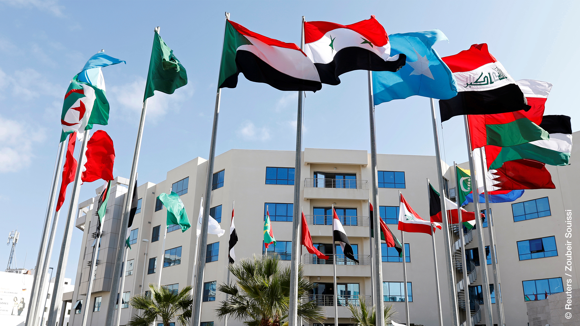 Flags are pictured before a preparatory meeting between Arab foreign ministers ahead of the Arab summit in Tunis, Tunisia March 29, 2019.