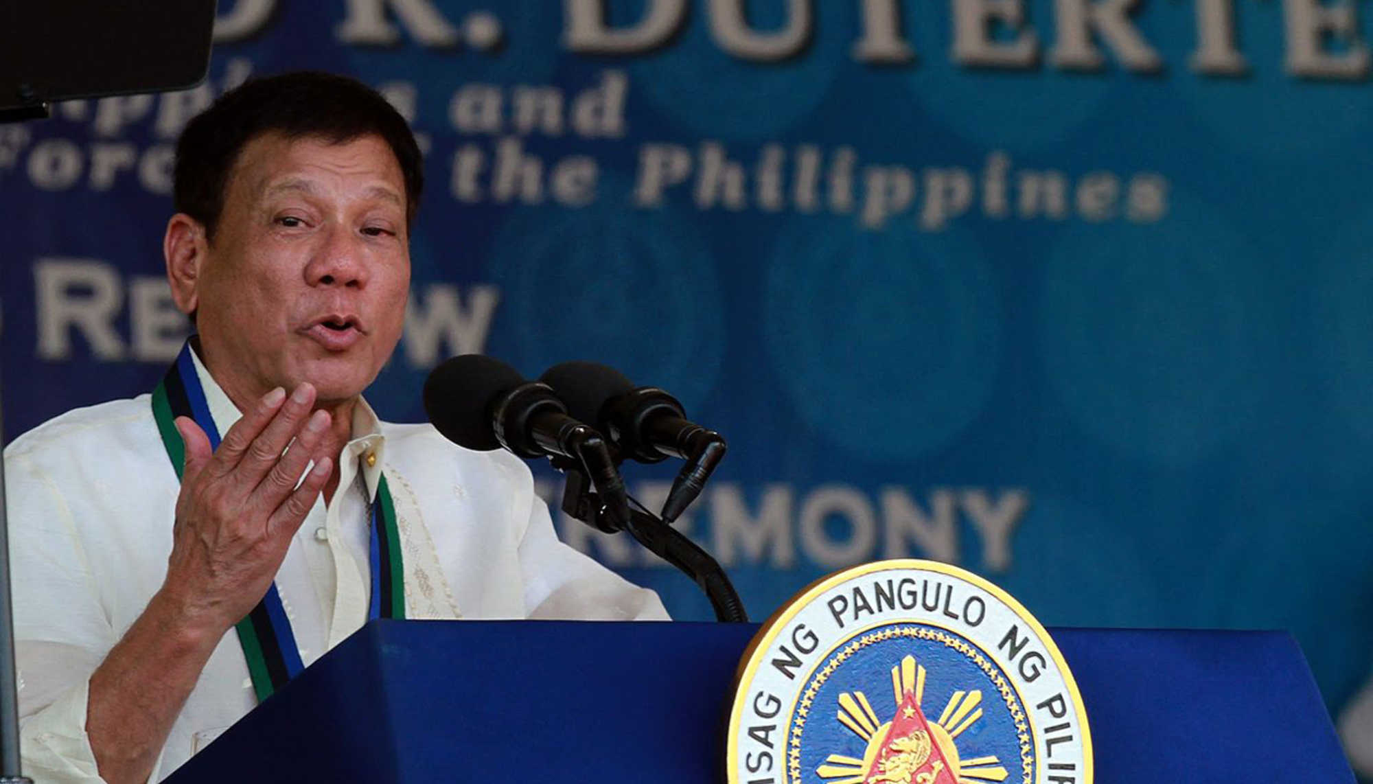 Prabowo Subianto on podium speaking
