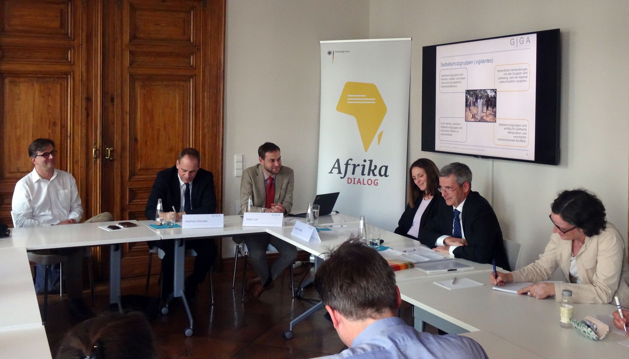 Picture of panelists and guests at the GIGA Talk