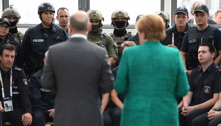 Angela Merkel und Olaf Scholz auf dem G20 Summit in Hamburg