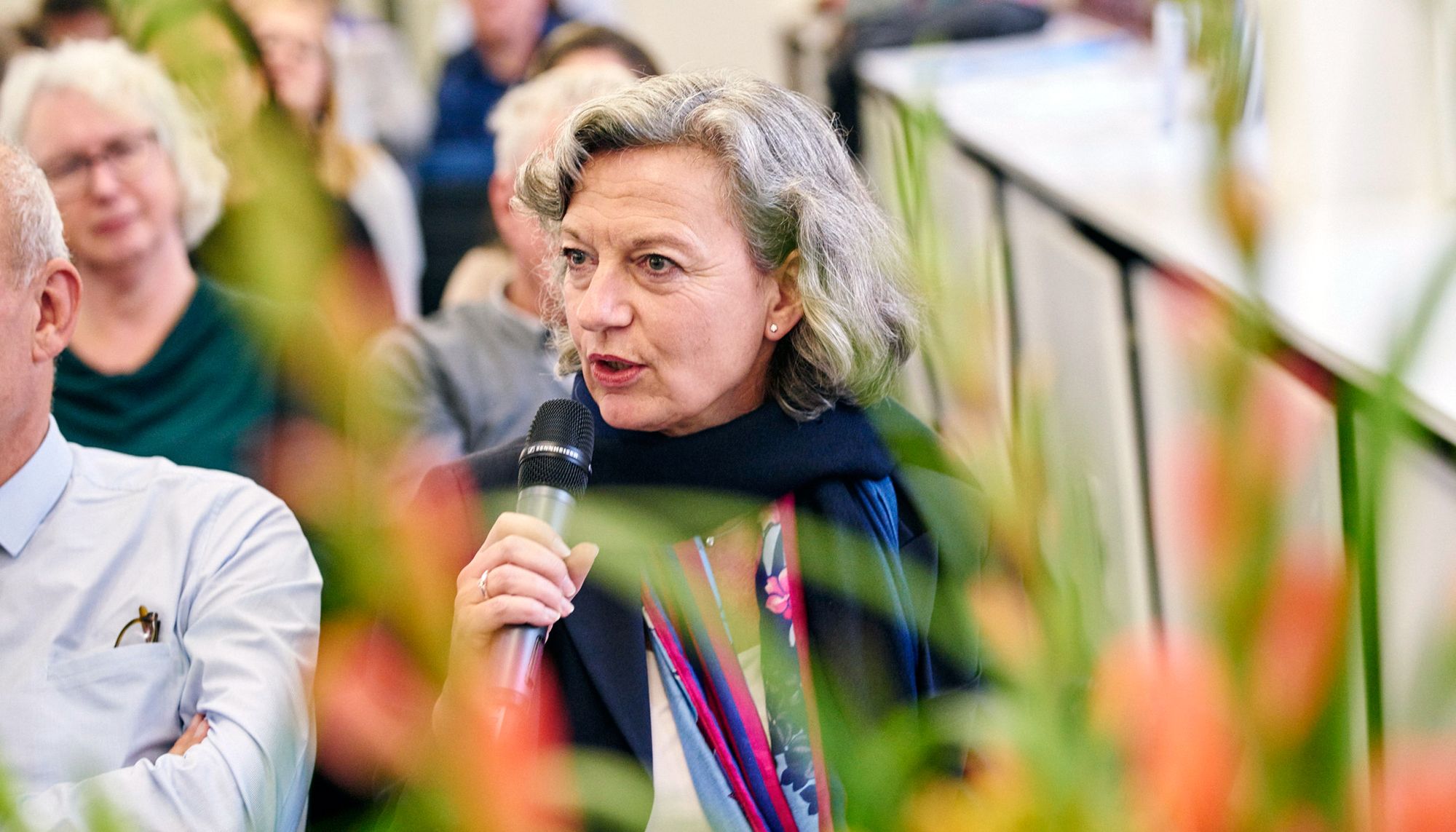 Picture of a person asking a question