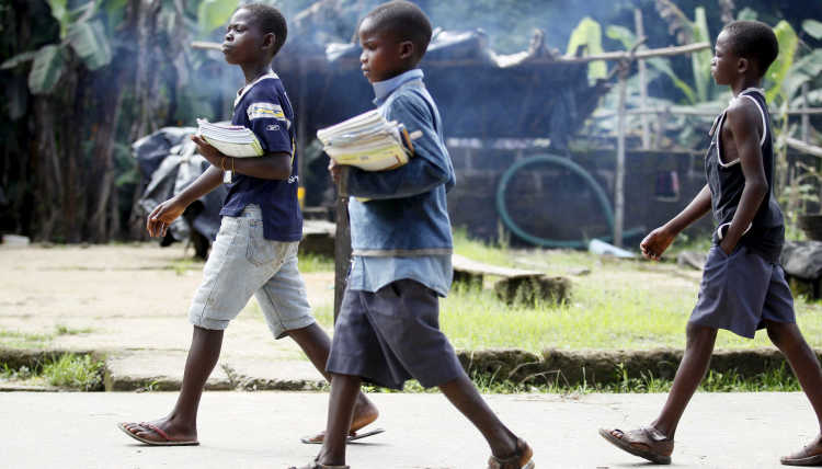 African children on their way to school.