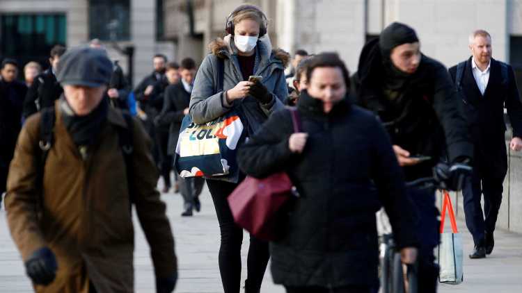 Walking woman wearing face mask