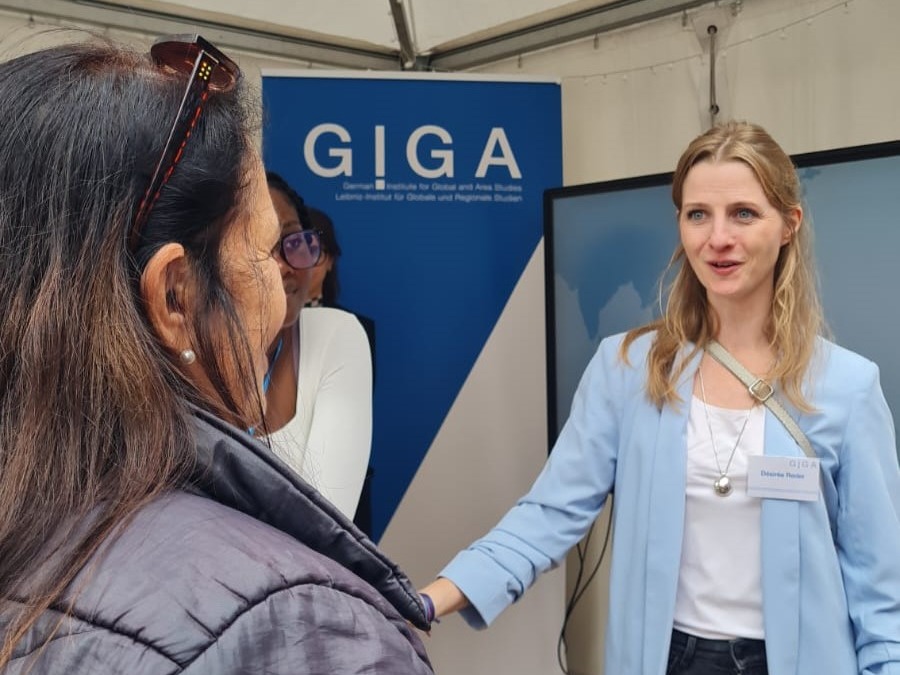 Désirée Reder talks to guests at the Festival on German Unity Day 2023 in Hamburg