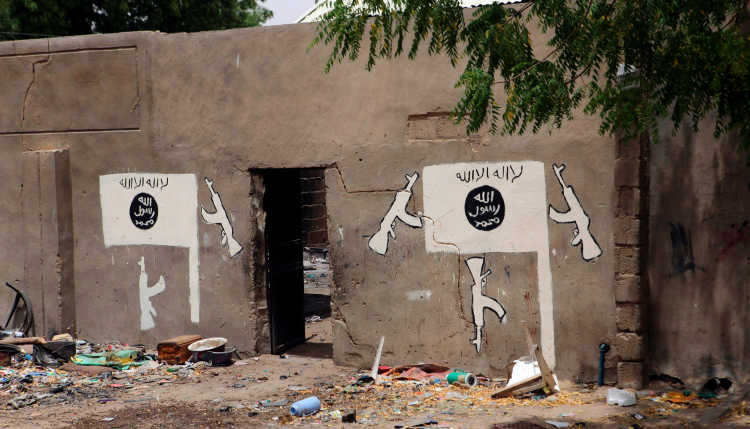 A wall painted by Boko Haram is pictured in Damasak